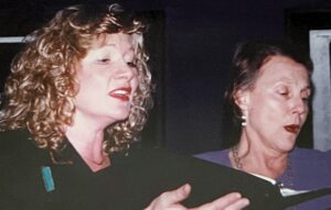 Trudy Schroeder singing a duet with Donna Kilmoska.
